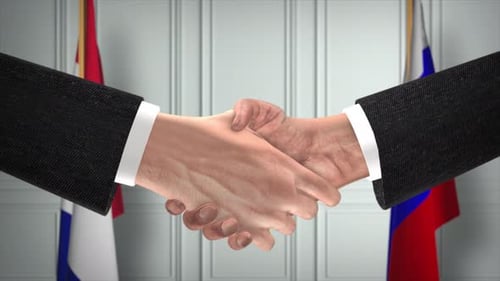 International Agreement Handshake Between Business People