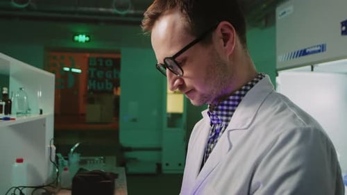 Scientist Working in Modern Biochemistry Laboratory