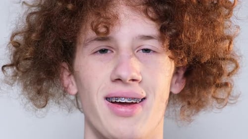Close Up of Smiling Teen with Braces