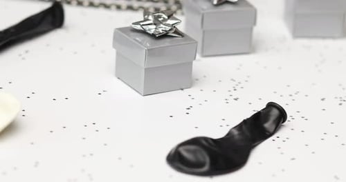 Rotation of Festival Birthday Party Background with Black and Silver Gift Box