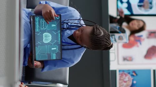 Vertical Video African American Patient Analyzing Brain Neurology Scan