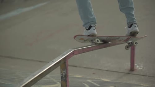Extreme sports - Slow motion skateboard grind on hand rail