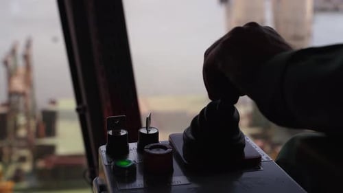 Man Hands Control Joysticks at Grain Terminal Operator Cabin Workplace Worker Controlling Loading