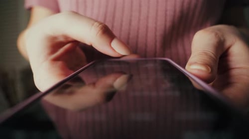 Close up footage of finger touching on screen mobile phone, hands slide device screen phone.