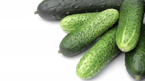 Fresh Green Cucumbers on White Background, Close Up
