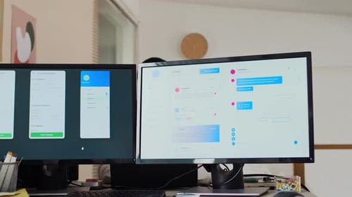 Dual Monitor Workspace with UI Design and Messaging Interface