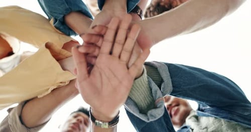 Below, hands together and team building in synergy or huddle for university education or study