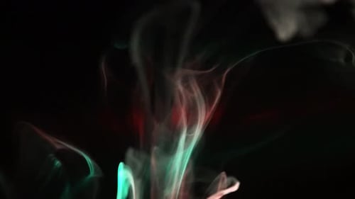 Abstract Red and Green Smoke on Dark Background