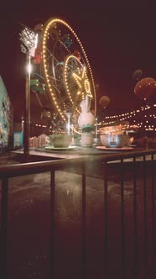 Nighttime Amusement Park With Ferris Wheel