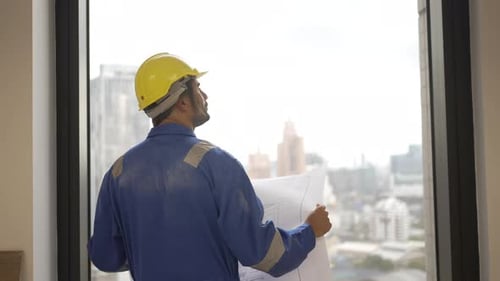 Engineer is working at tower.