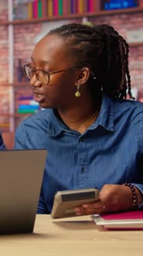 African American Man and Woman Review Earnings and Revenue Reports