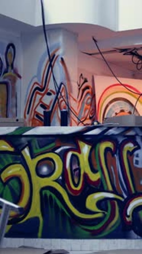 Vertical Video Empty Derelict Building with Creative Graffiti Street Art on Walls