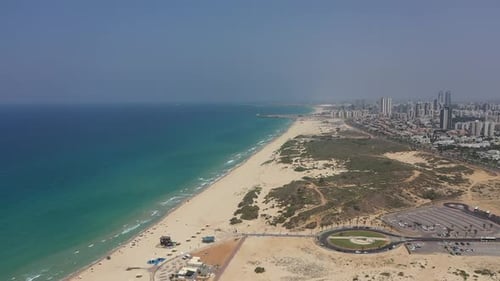 Aerial video on the coastline of Ashdod Israel on a sunny day