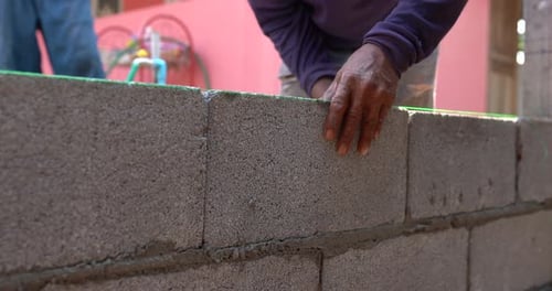Perfect Masonry Aligning Concrete Blocks with a String Line for Straight Walls