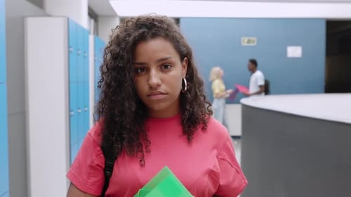 Portrait of Happy Hispanic Latin Young Student Woman at High School