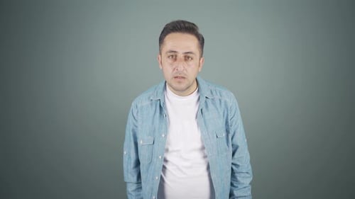 Adult with Changing Facial Expressions in Studio