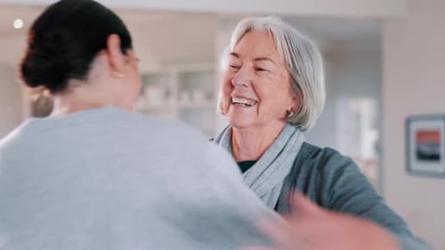 Senior, woman or daughter with hug and happy in living room of home for reunion and love
