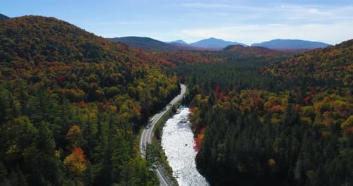 Aerial Drone, Road Through Colorful Forest Wilderness, Mountains & River Aerial