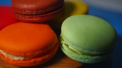 French colorful macarons background close. Colorful French macarons background, Different colorful m