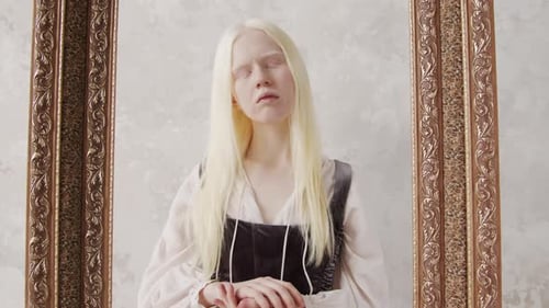 Woman with Blonde Hair in a Picture Frame