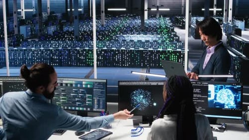 Software Developers Cooperating in Data Center Reviewing AI Diagnostics