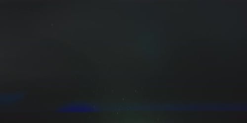 Dust Particles With Anamorphic Flare