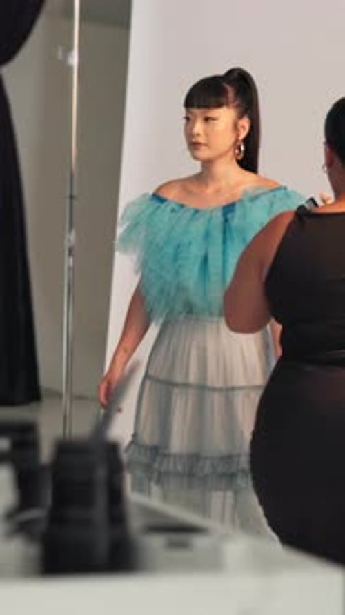 BTS, photoshoot and styling with woman in studio for advertising campaign or fashion magazine