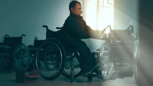 A Disabled Man Assembles a Stroller