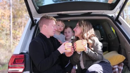 Happy Family Enjoying Time Together Outdoors