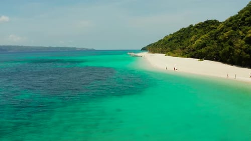 Tropical Beach and Turquoise Lagoon Water