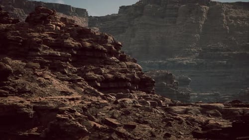 Rocky Landscape with Rugged Cliffs and Earthy Textures in a Desert Setting