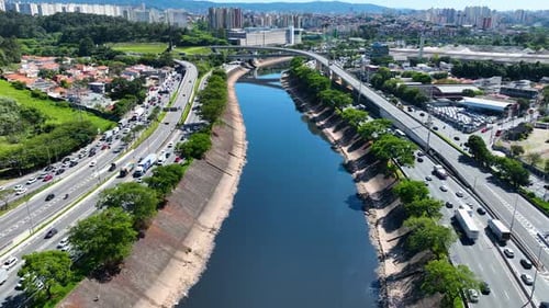 Cityscape of rush traffic jam at freeway road. Transportation scenery.