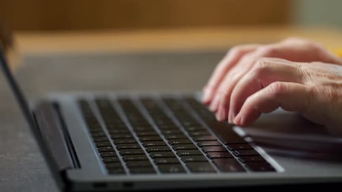 Senior Woman Freelancer Types Information Professionally