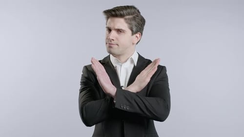 Dissatisfied Businessman Disapproving with No Sign Refuse Offer Rejecting
