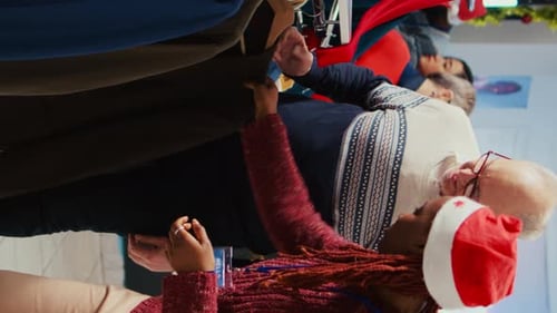 Senior Man Shopping in Store During Christmas Season