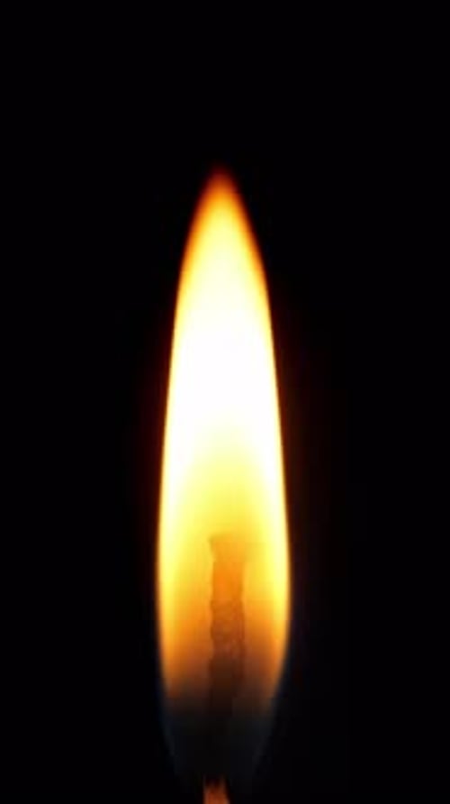 Candle Burning in the Dark Candlelight in the Night Vertical Footage