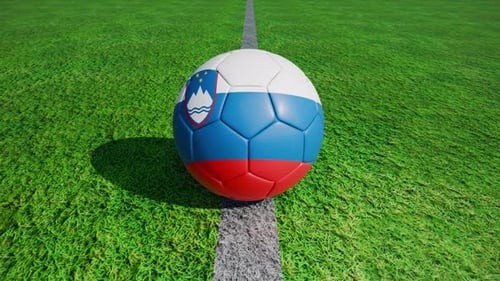 Spinning National Flag Soccer Balls on Green Field