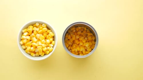 Canned and Fresh Corn Kernels on Yellow