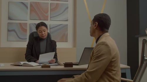 Business Professionals Meeting in a Bright Office