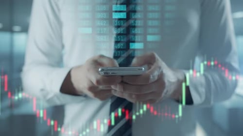 Le trader travaille avec une Appli mobile, un écran de téléphone avec des graphiques boursiers et une analyse de données.