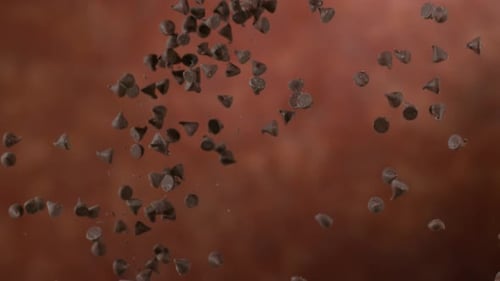 Chocolate chips falling in slow motion phantom flex 4k background