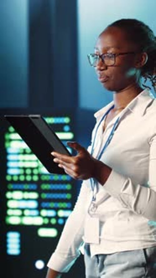 Vertical Video Specialist Strolling Through Data Center
