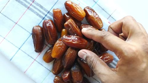 Top View of Hand Pick Date Fruits