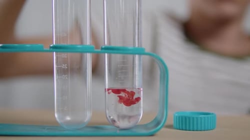 Child Performing a Science Experiment at Home
