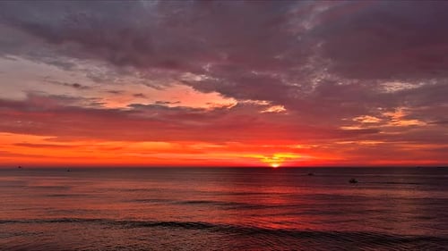 An Incredible Sunrise Over Ocean at Dawn As Sun Rises