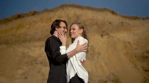 Affectionate Couple Embracing in Natural Setting