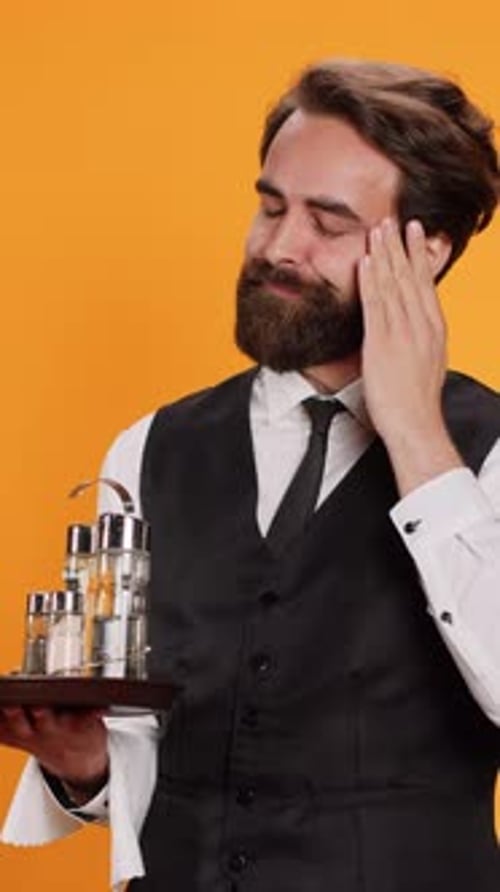 Vertical Video Overworked Waiter Feels Tired on Camera