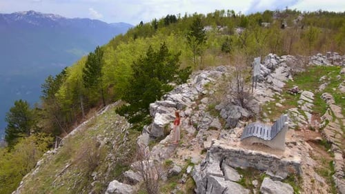 Aerial Video of a Young Woman Tourist Visitng the Grlo Sokolovo Canyon