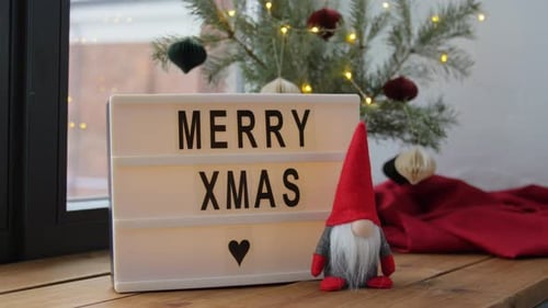 Festive Christmas decorations on wooden surface indoors