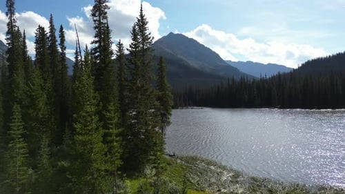 Scenic Mountain Lake Surrounded by Pine Trees. British Columbia, Canada.